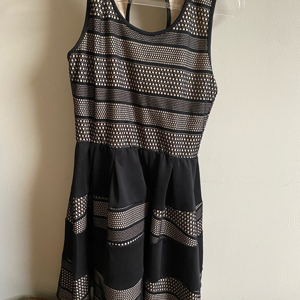 Iconic black dress great steal 🌟